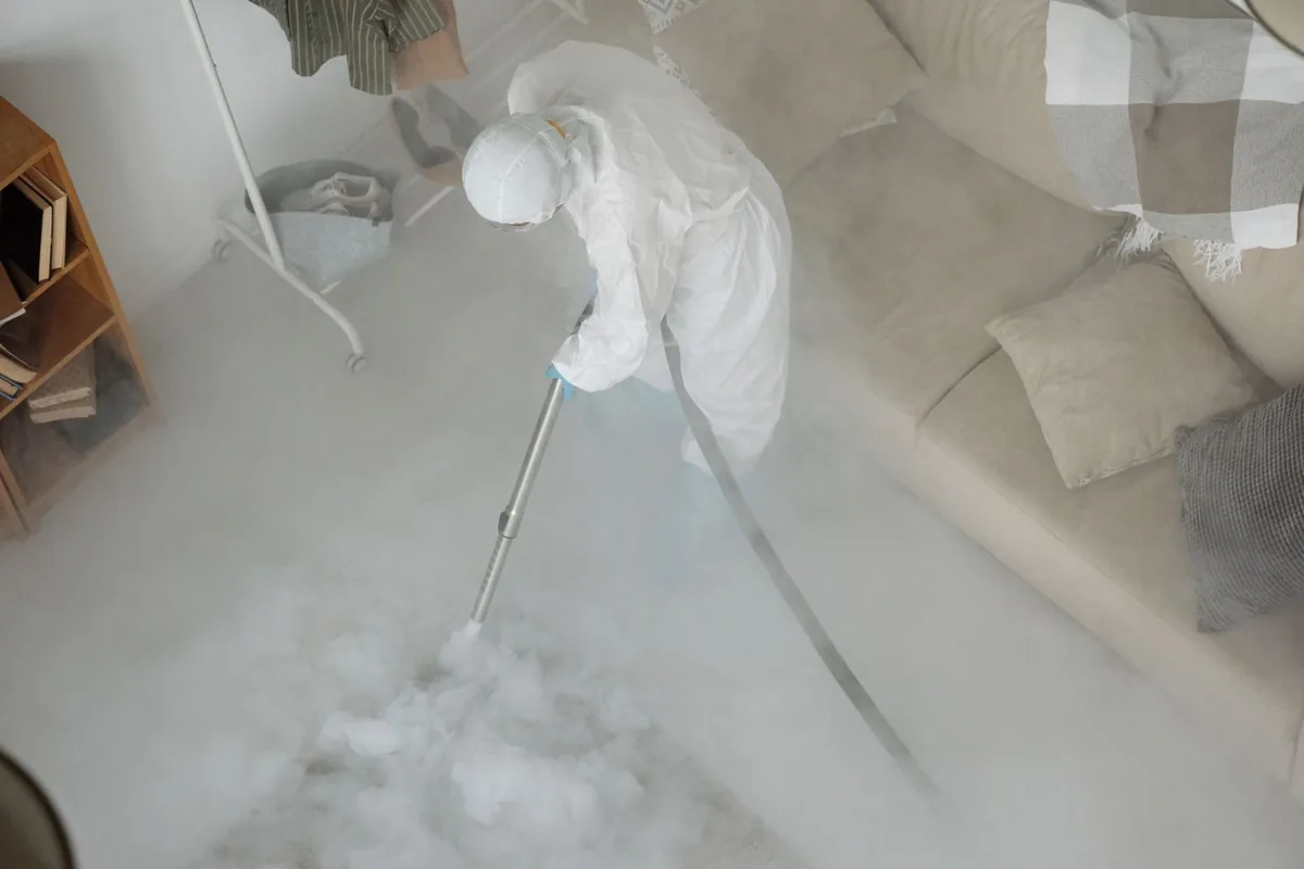 Biohazard cleanup technician in protective equipment, Rancho Santa Margarita, CA
